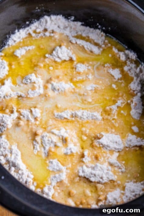 Melted butter on cake mix in a Slow Cooker.