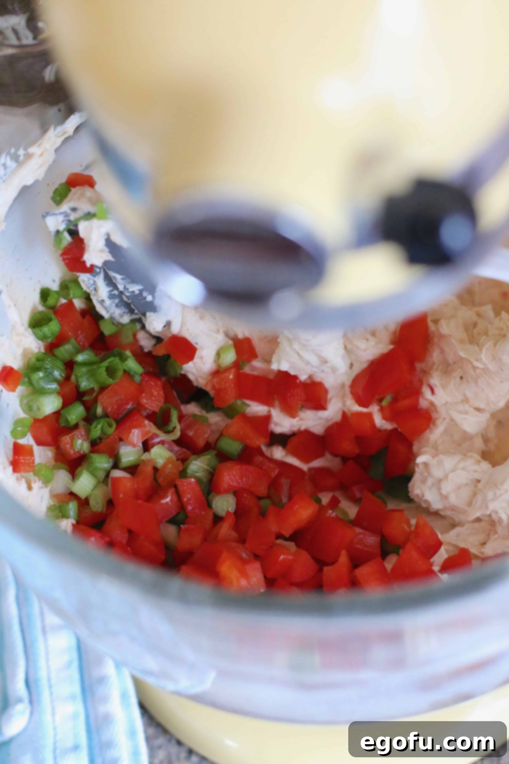 The Great Pumpkin Cheese Ball 9 diced red pepper and green onion mixed together with vegetable cream cheese and plain cream cheese