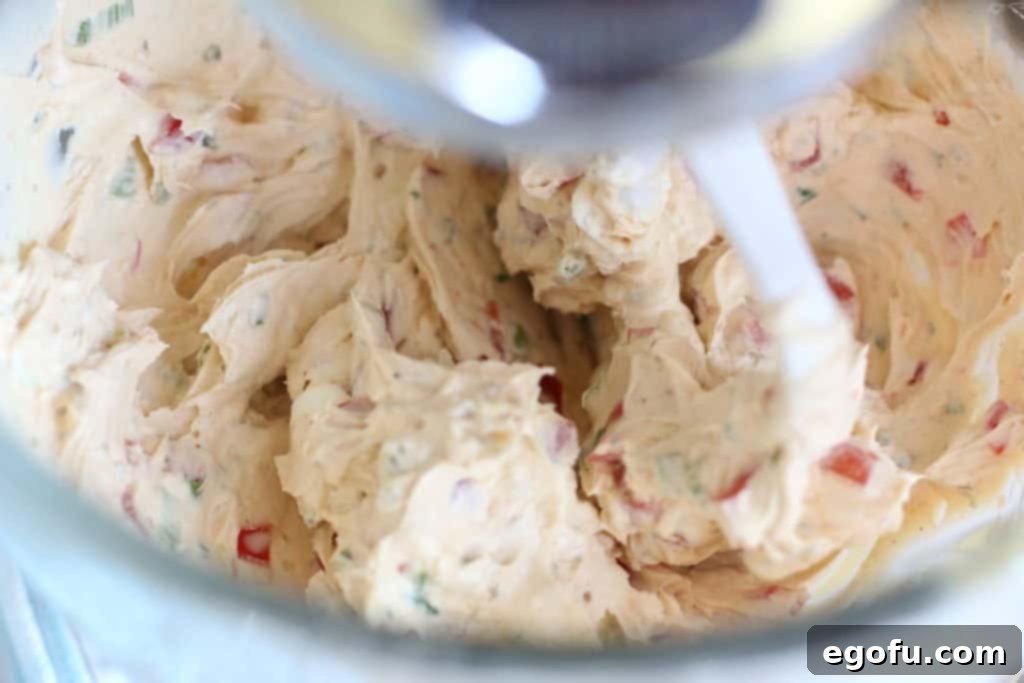 The Great Pumpkin Cheese Ball 10 vegetable cream cheese, cheeseball mixture.