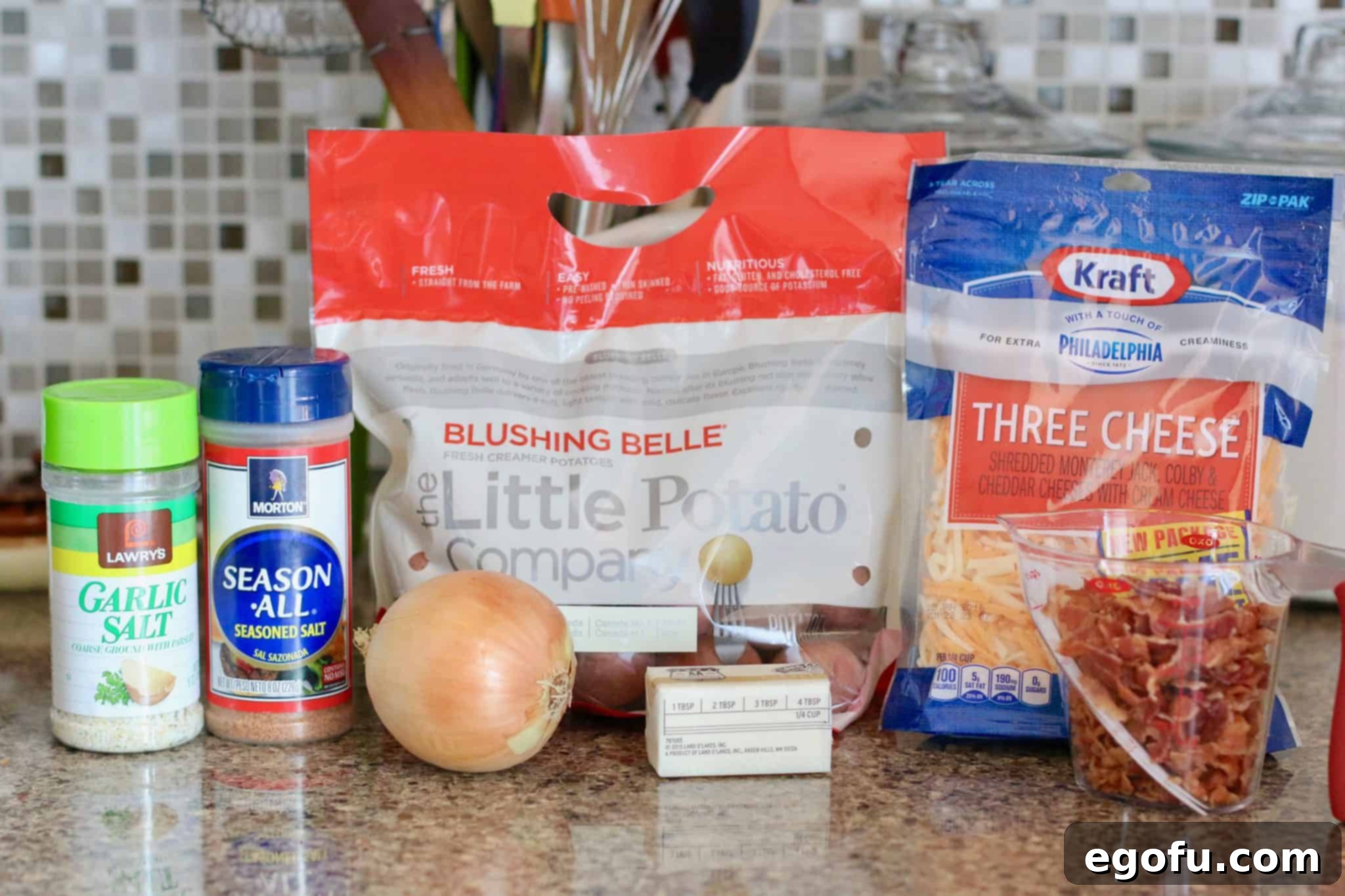 Little Potatoes, cheddar cheese, onion, bacon, butter, garlic salt, seasoned salt.