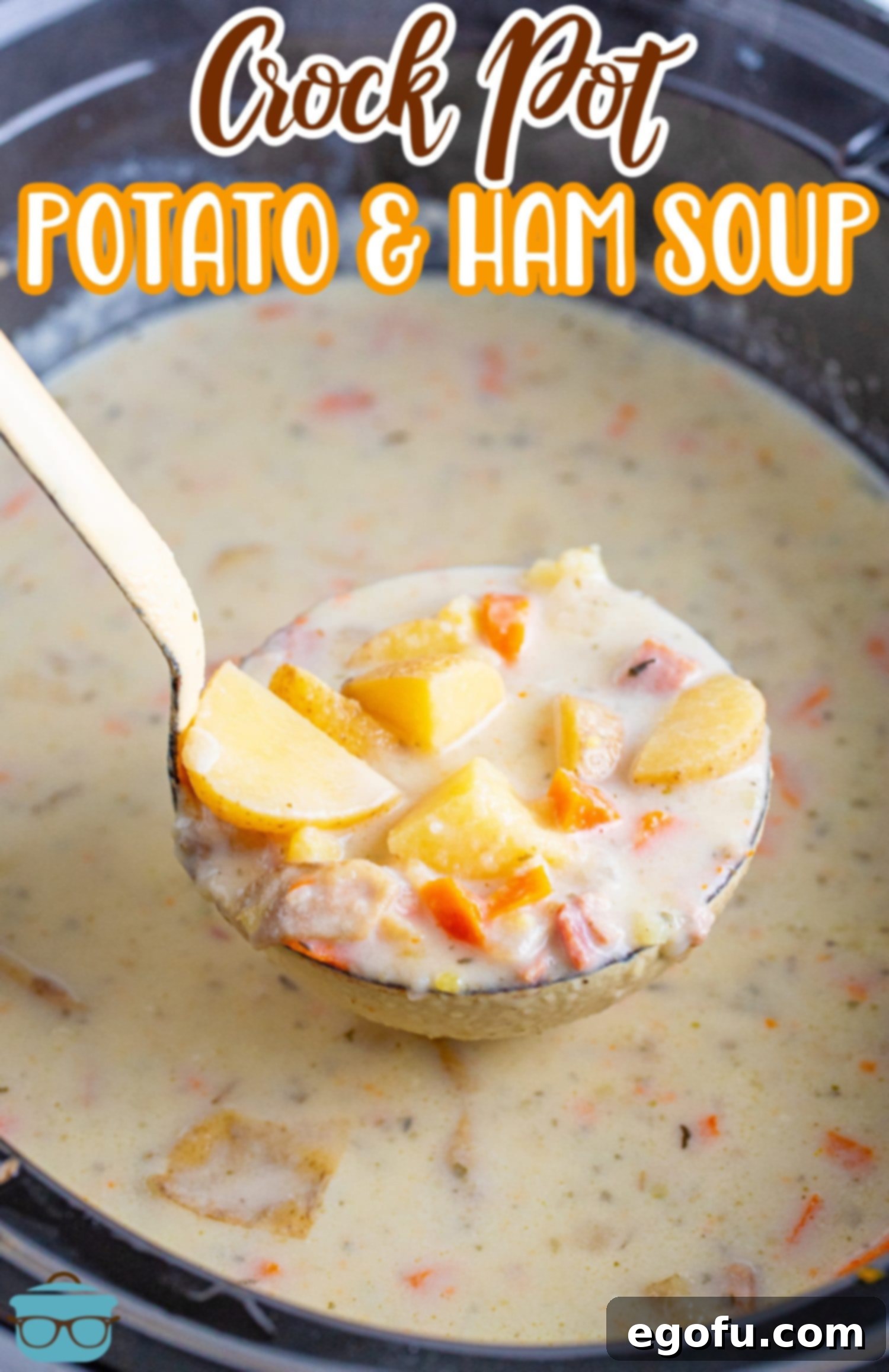 A Slow Cooker full of Creamy Potato and Ham Soup.