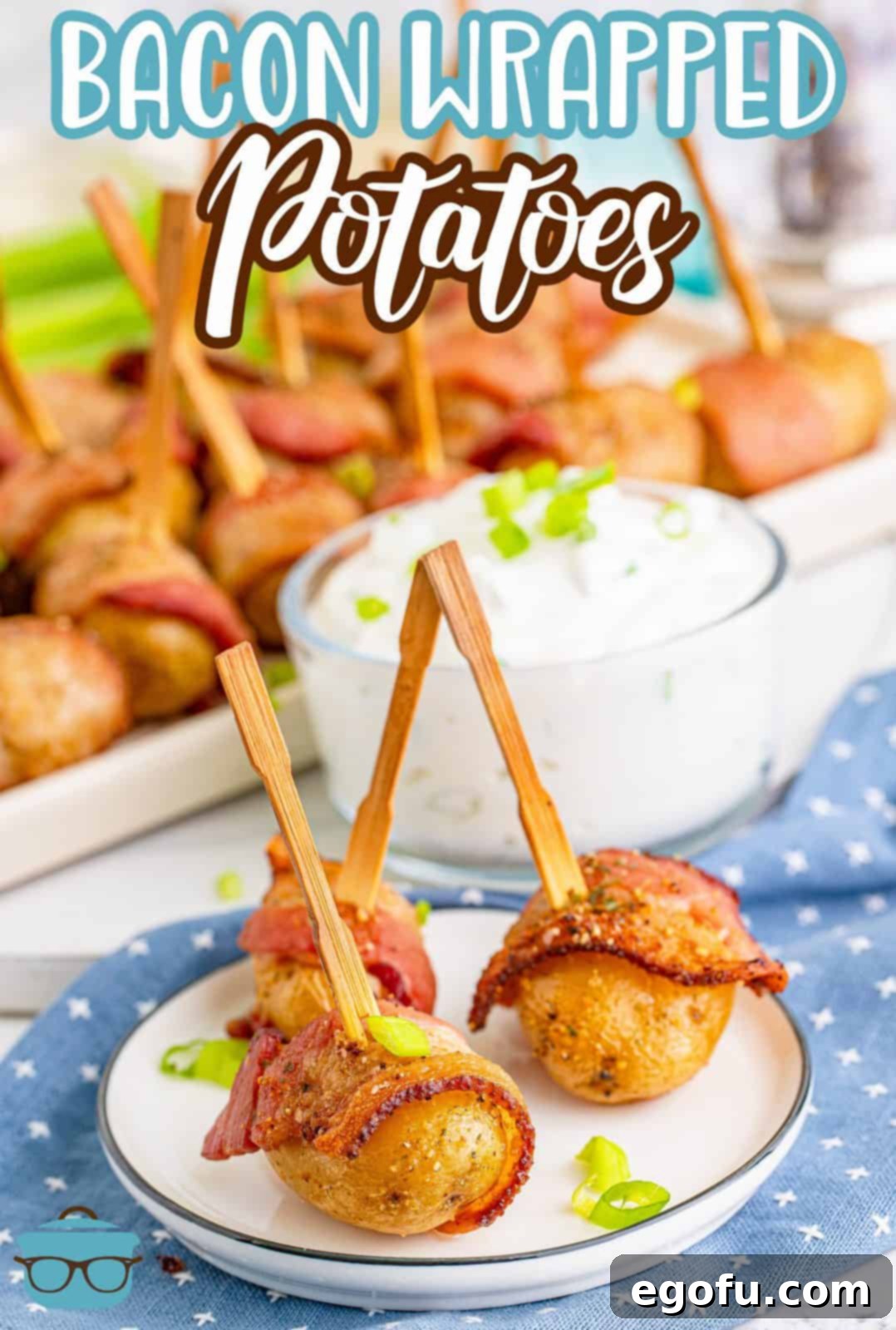 Three bacon-wrapped potatoes, secured with toothpicks, displayed on a white plate with more in the background.