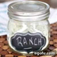 A delicious image of homemade ranch dressing in a bowl, showing its creamy texture and fresh herbs, ready to be enjoyed.