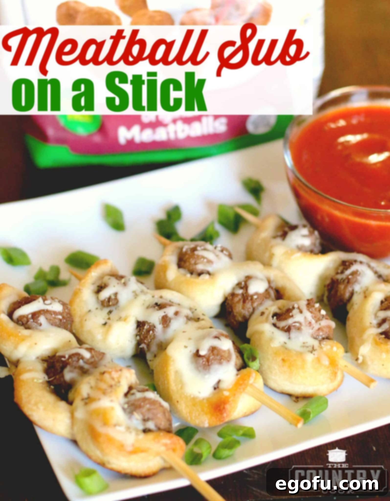 Meatball Subs on a Stick ready for baking, showcasing the neat arrangement of dough-wrapped meatballs on skewers.