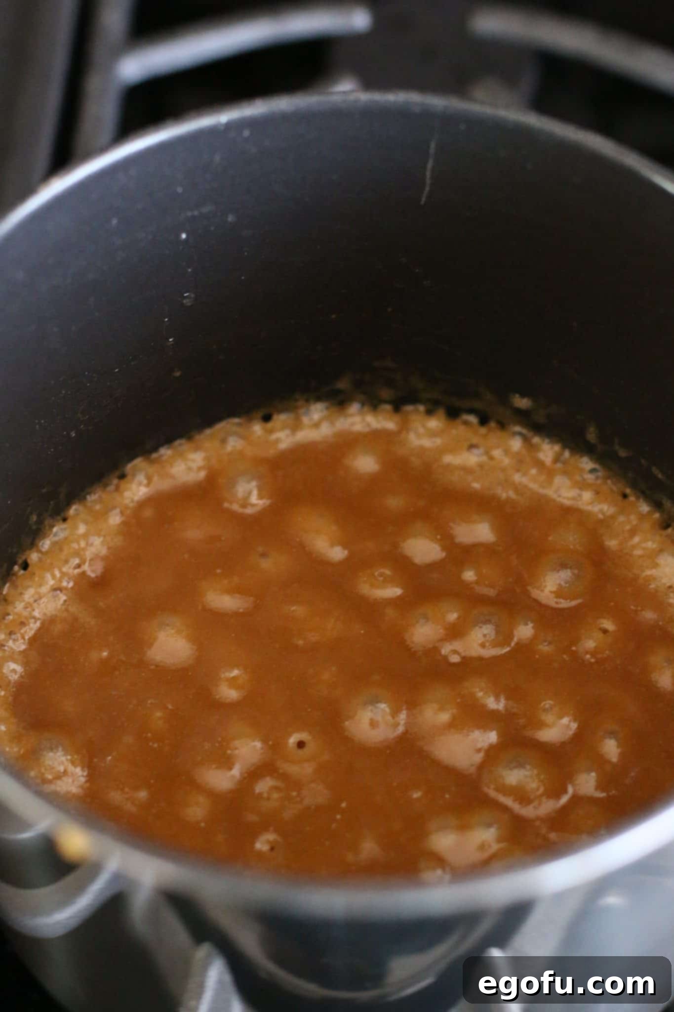 brown sugar and butter bubbling in a sauce pan.