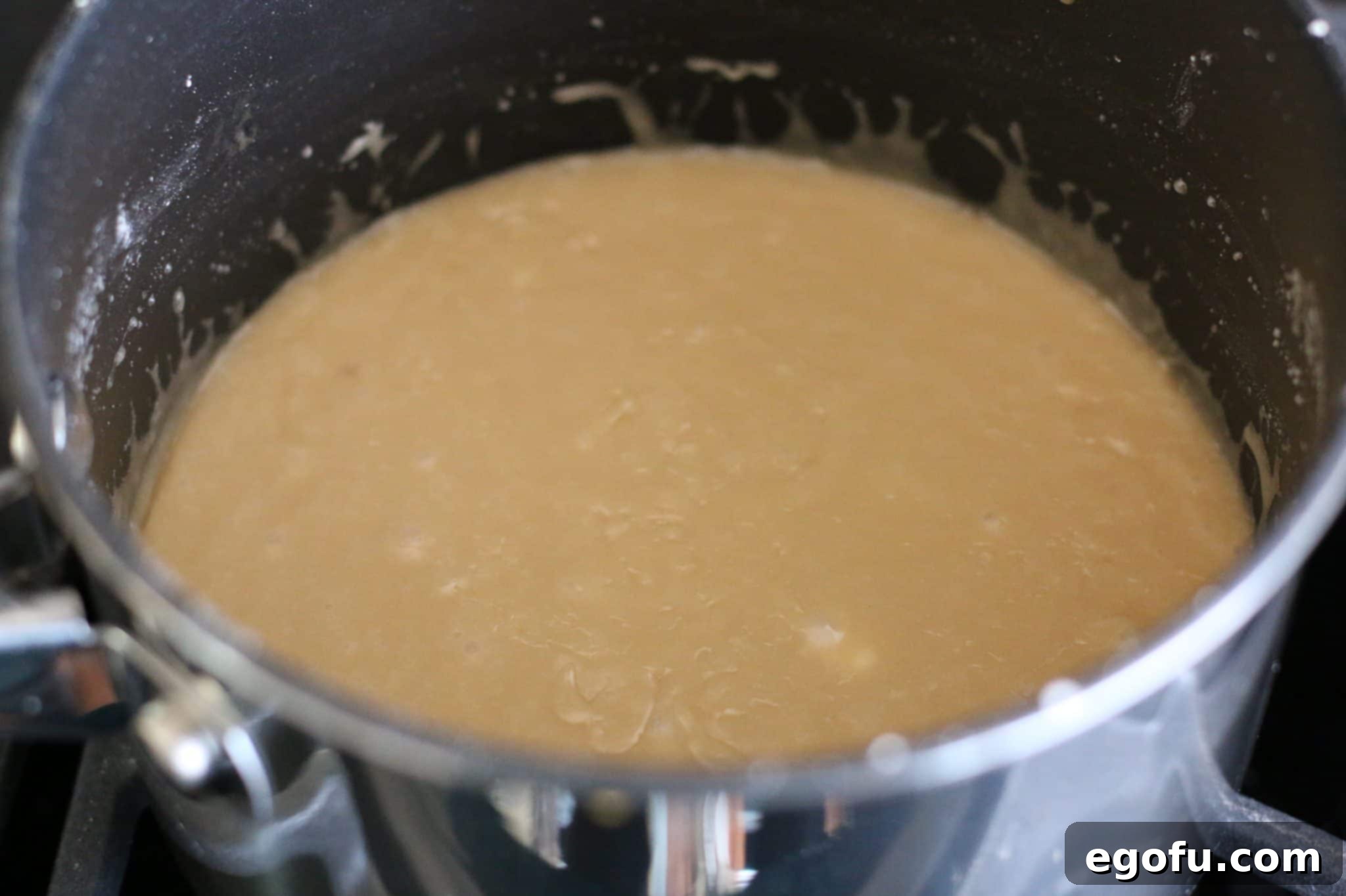 brown sugar frosting whipped together in a pot.