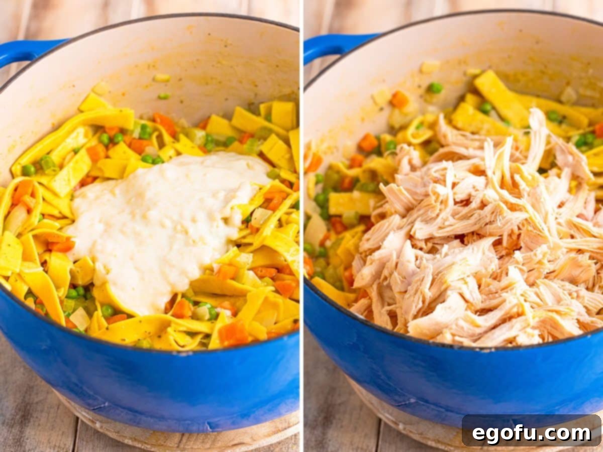 Soul-Warming Chicken and Noodles 7 The thickening and final assembly steps: first, a milky flour roux is added to the pot of simmering noodles and vegetables; second, cooked shredded chicken is gently stirred into the pot, creating the complete hearty dish.