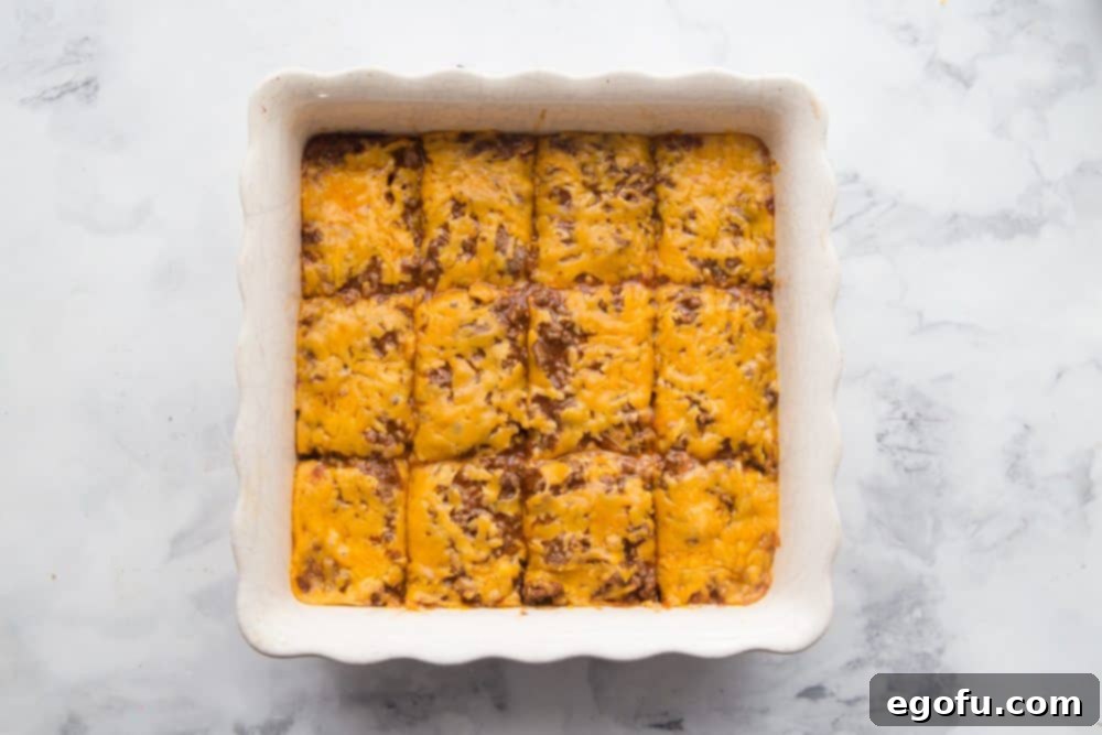 Impossible Bisquick Burrito Bake cut into slices.