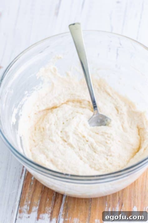Bisquick mix and water in a mixing bowl.