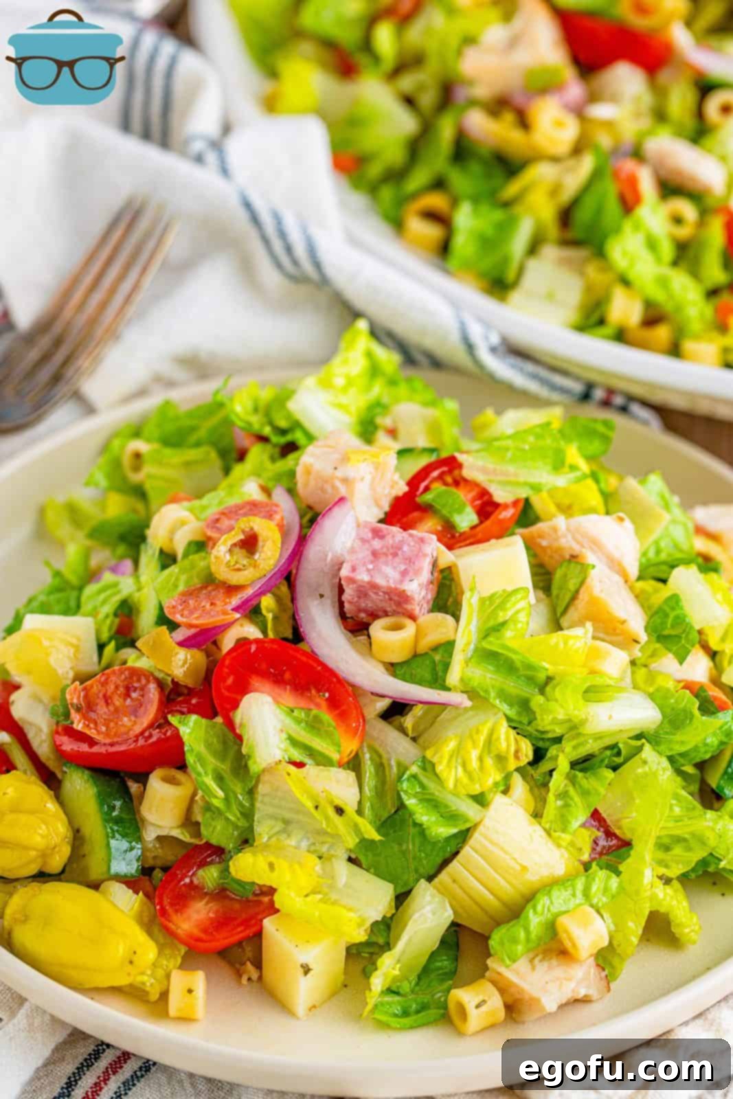 Vibrant Italian Chopped Salad 9 Italian chopped salad shown on a small white salad plate.