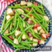 Grilled diced potatoes and fresh green beans recipe from The Country Cook