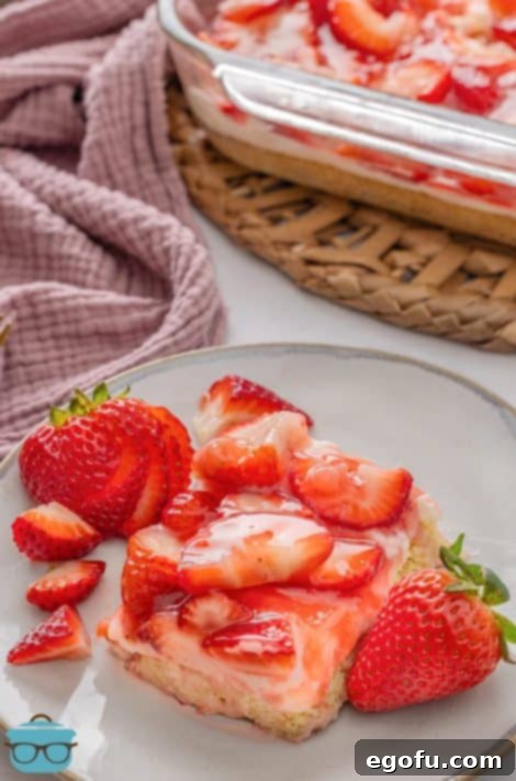 A plate with a big portion of Strawberries and Cream Bars, ready to serve.
