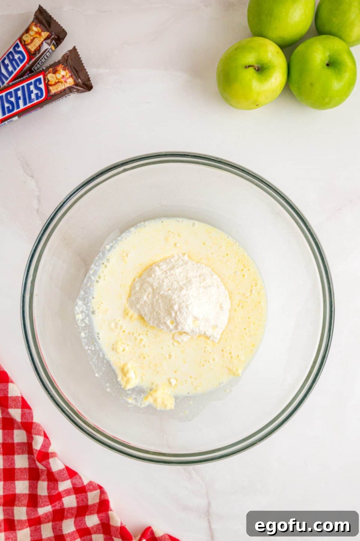 Creamy Snickers Apple Delight 4 Milk and pudding mix to be mixed together.