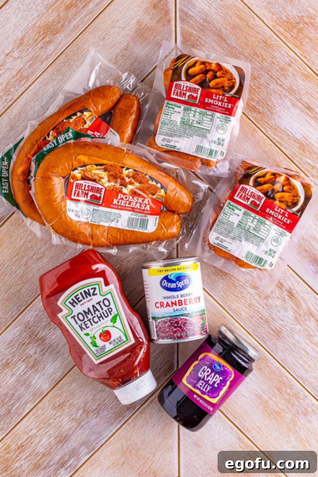 kielbasa, Lit'l smokies, ketchup, whole berry cranberry sauce, grape jelly.