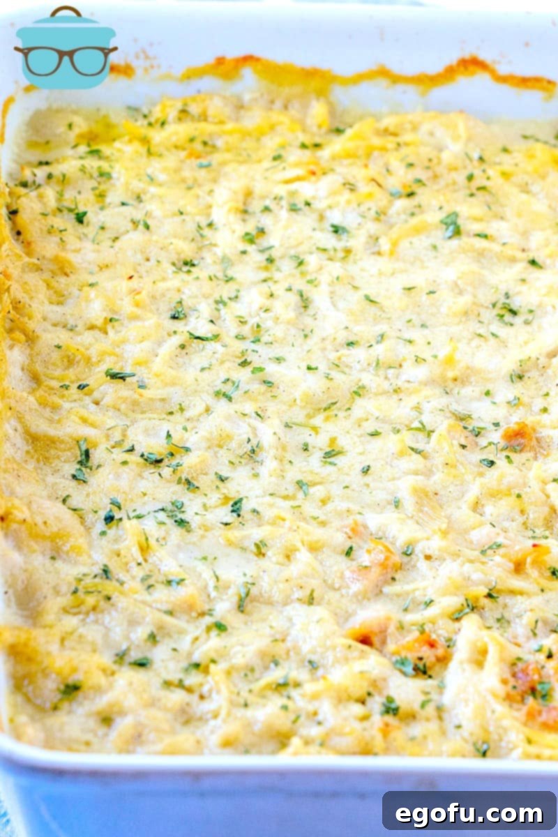 finished cooking, chicken and dumplings casserole in a baking dish.