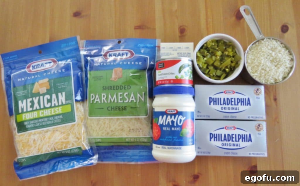 Baked Jalapeño Cheese Dip 5 Collection of Jalapeno Popper Dip ingredients: cream cheese, mayonnaise, Mexican Cheese Blend, shredded Parmesan Cheese, chopped green chiles, chopped jalapeños, Panko bread crumbs, salted butter.