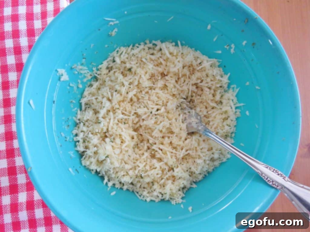 Baked Jalapeño Cheese Dip 8 Panko bread crumbs, Parmesan Cheese, melted butter, and dried parsley mixed together in a bowl for the topping.