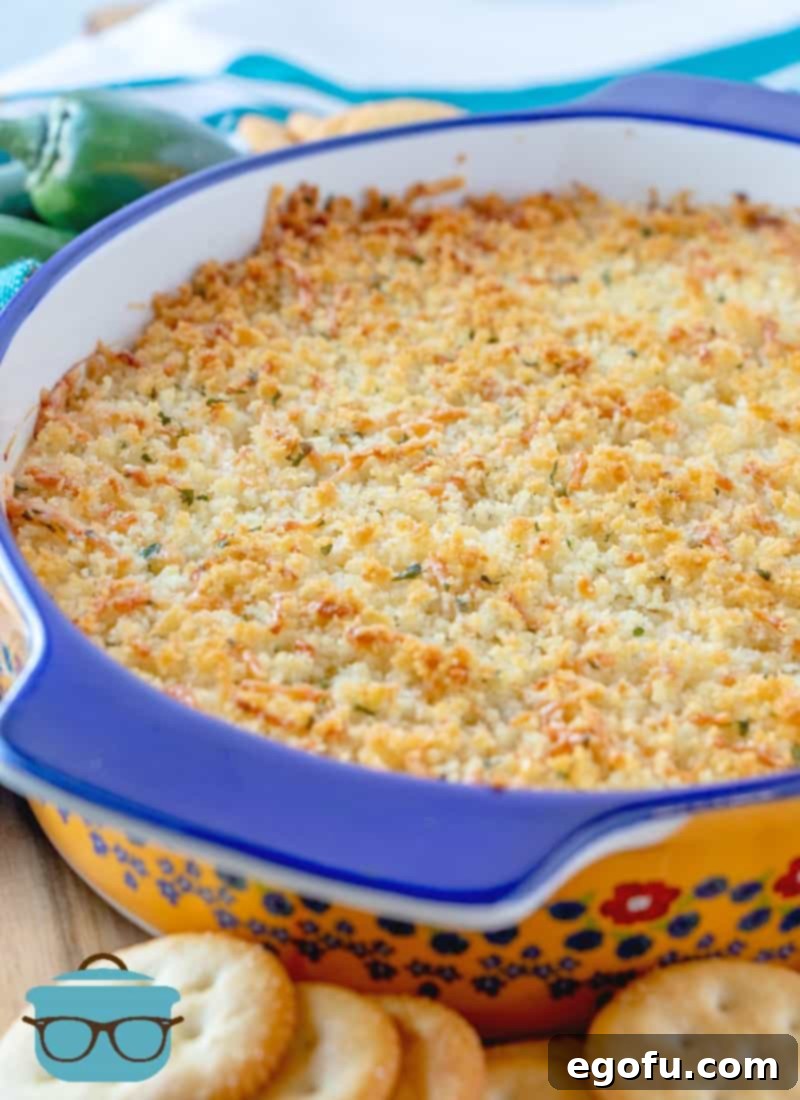 Baked Jalapeño Cheese Dip 10 Fully cooked Jalapeno Popper Dip in a dish, golden brown and bubbling.