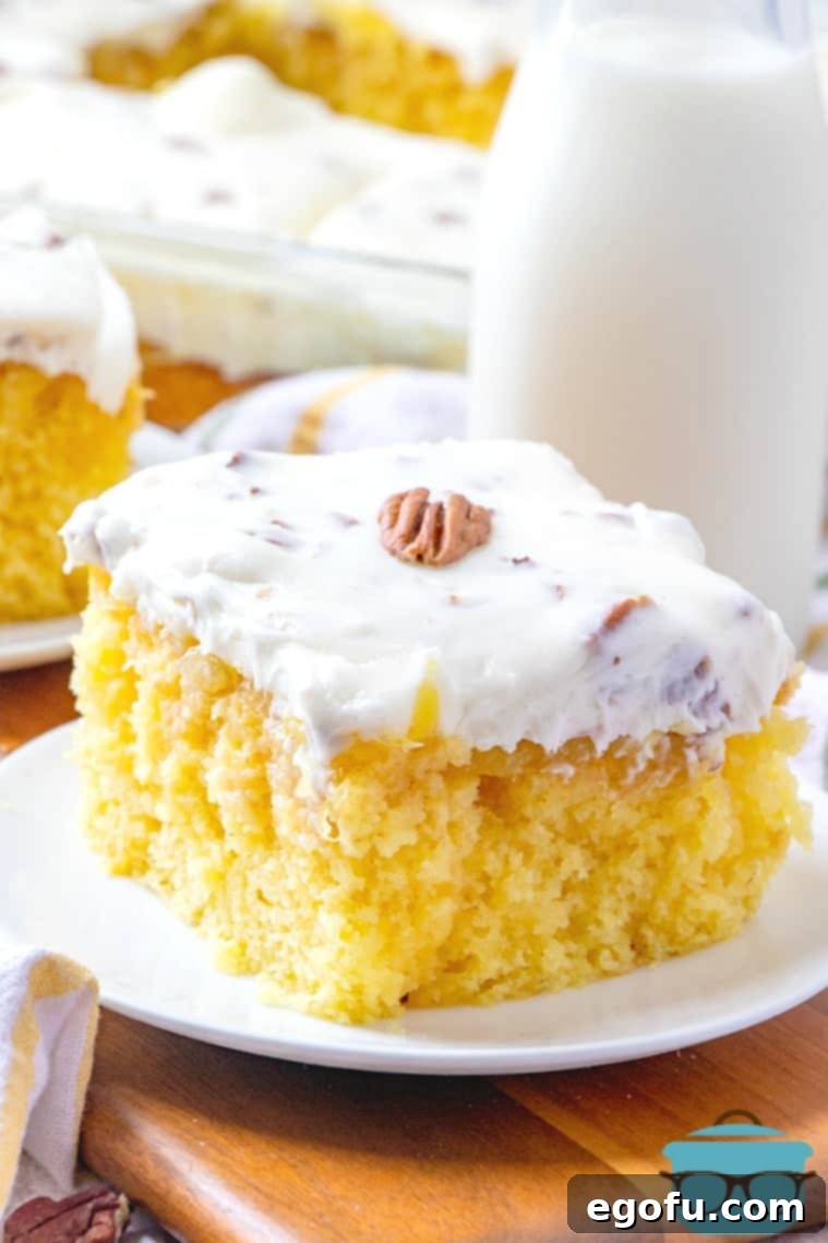 ELVIS PRESLEY Cake slice on a white plate with milk in the background
