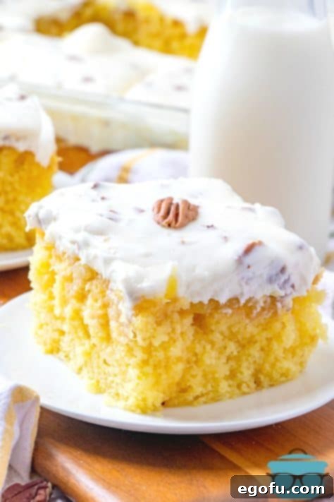 Elvis Presley Cake slice on a white plate with milk in the background