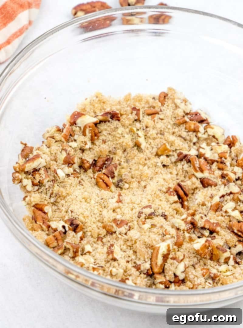 Melted butter, brown sugar, cinnamon, and flour mixed for the streusel topping.