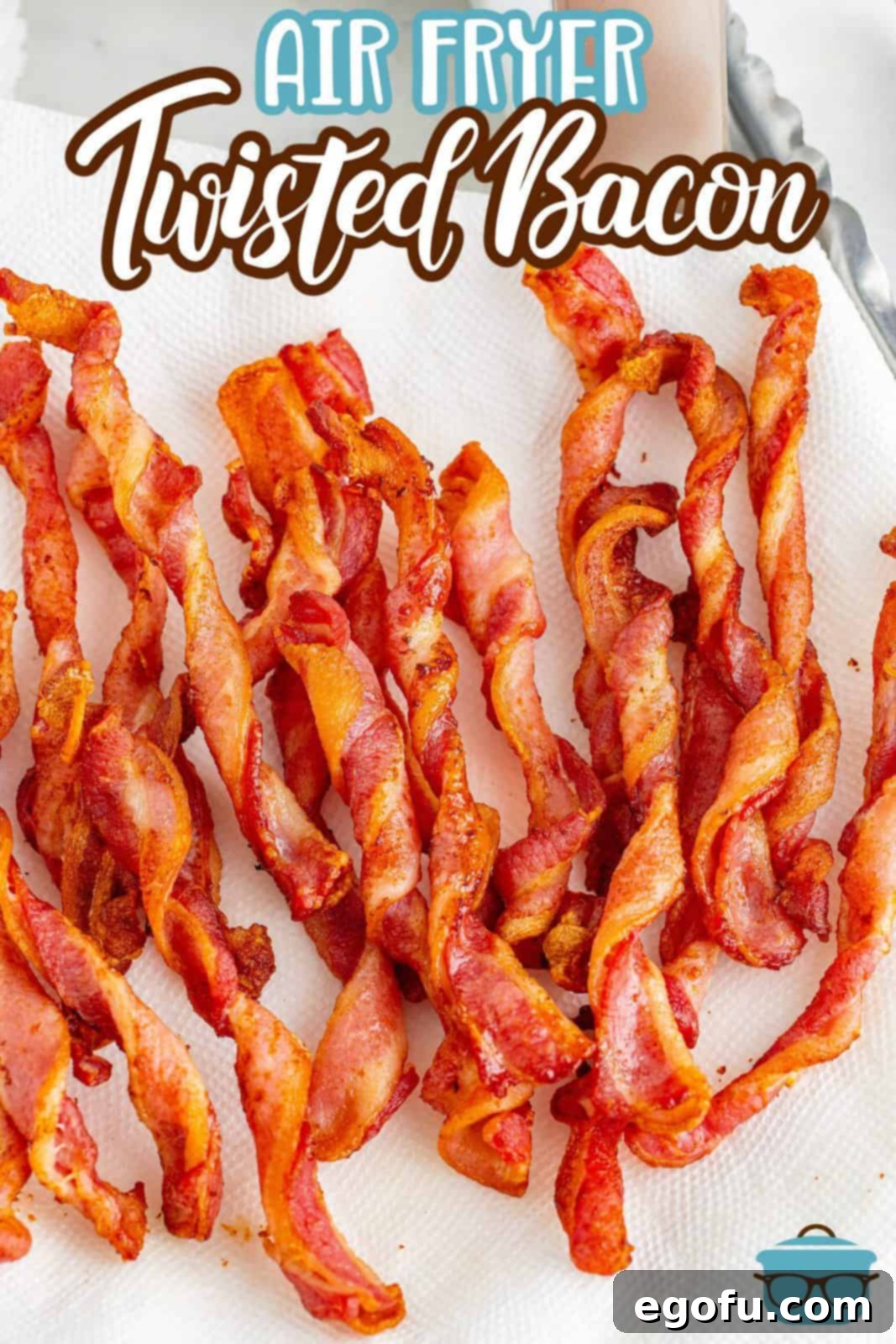 Crispy Air Fryer Bacon Spirals 3 Close-up of crispy Air Fryer Twisted Bacon on a white plate, perfect for pinning on Pinterest.