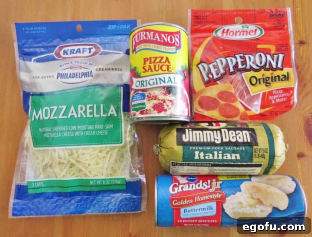 Puffy Pizza Bake 4 Italian sausage, pizza sauce, Pillsbury biscuits, mozzarella cheese, sliced pepperoni.