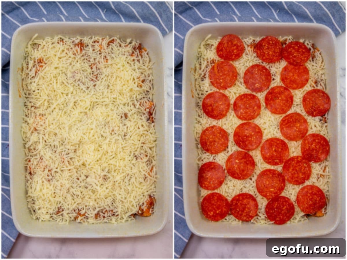 Puffy Pizza Bake 7 shredded mozzarella cheese sprinkled on casserole, slices of pepperoni on top of shredded cheese.
