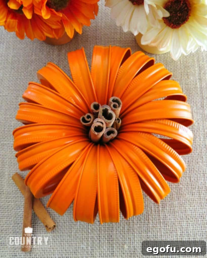 Autumn Jar Lid Pumpkins 8 beautifully fanned out mason jar lid pumpkin with cinnamon stick stem
