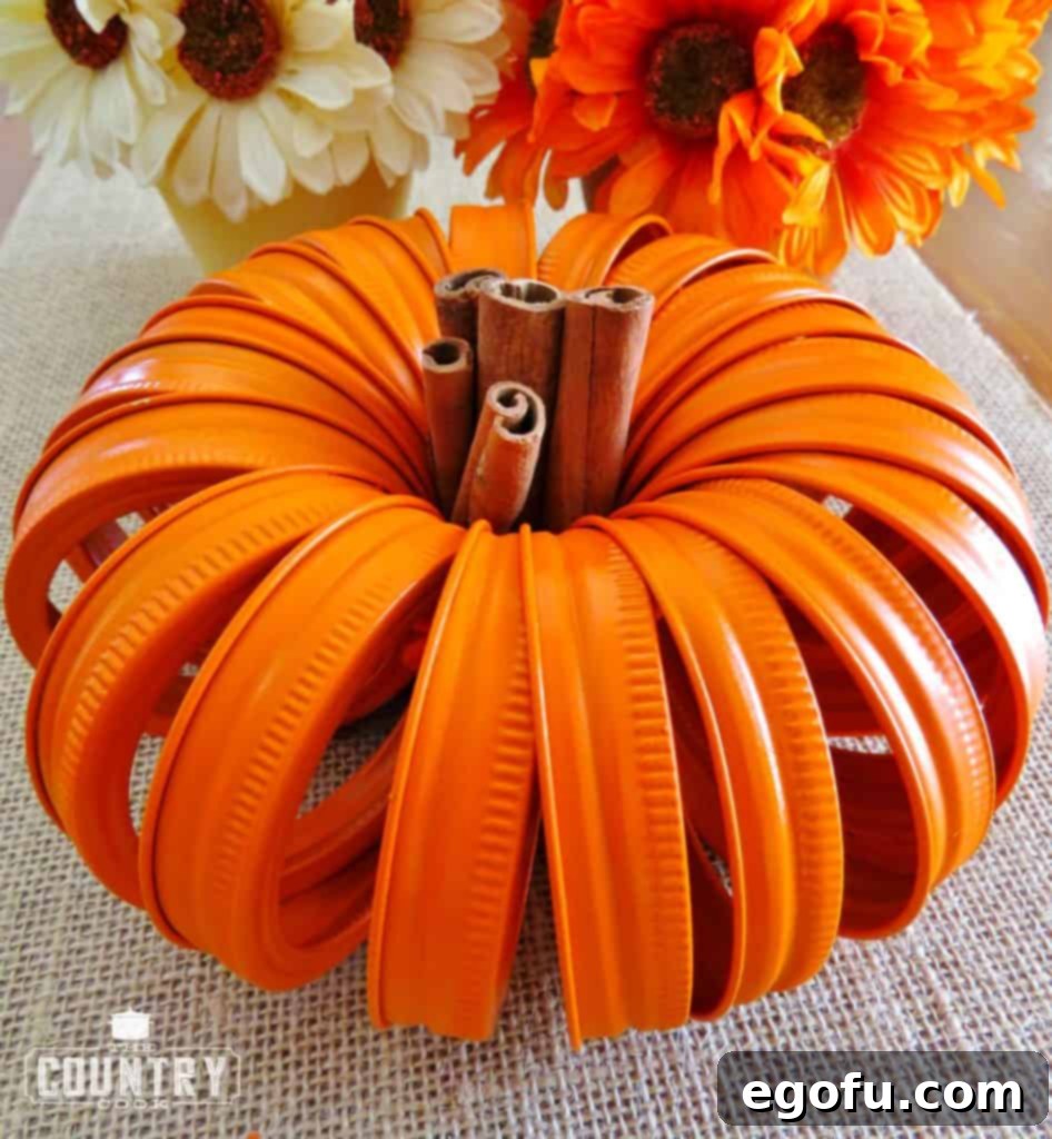Autumn Jar Lid Pumpkins 9 mason jar lid pumpkin with a warm cinnamon stick stem