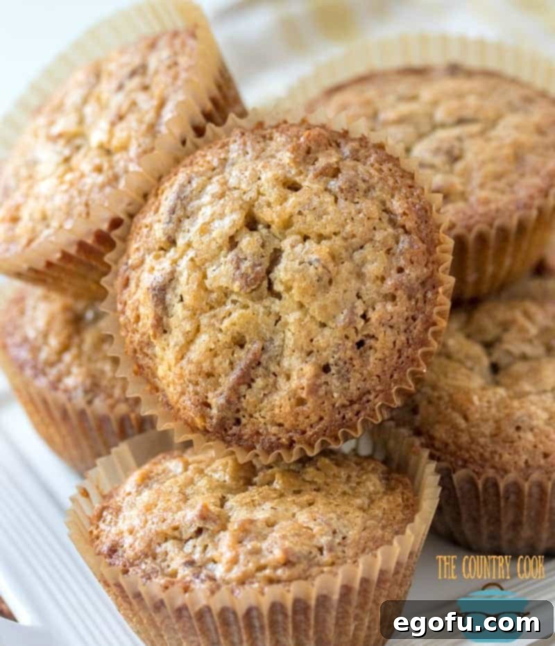 stack of pecan pie muffins on a plate.