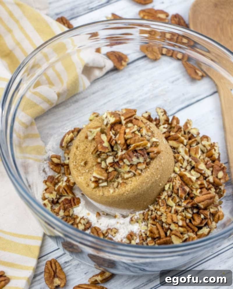 brown sugar, flour and chopped pecans in a clear bowl
