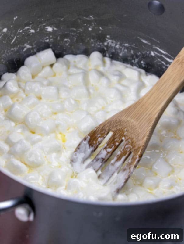 Melted marshmallows and butter in a saucepan, smooth and combined