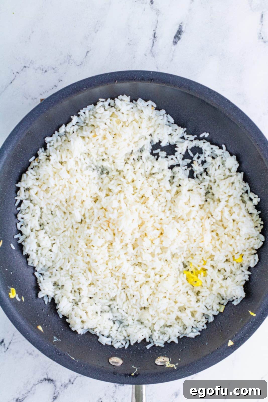 Sizzling Beef Fried Rice 8 Rice added to pan.