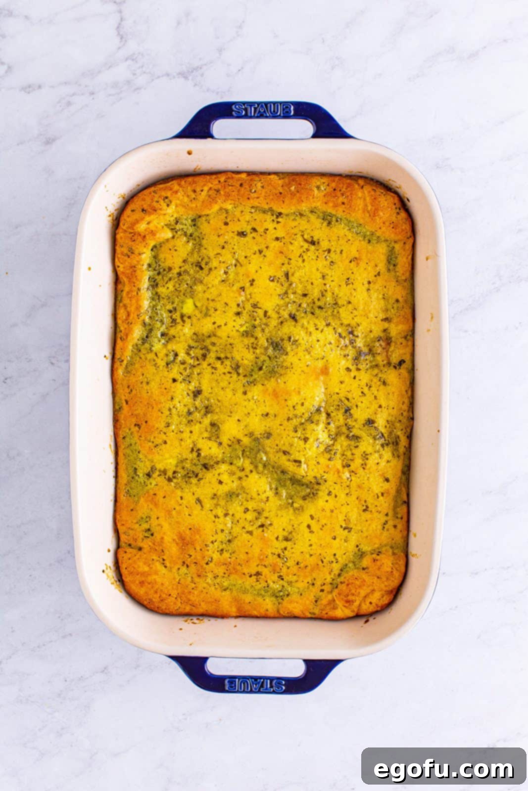 The Italian Sub Squares freshly baked and removed from the oven, boasting a beautiful deep golden brown crust.