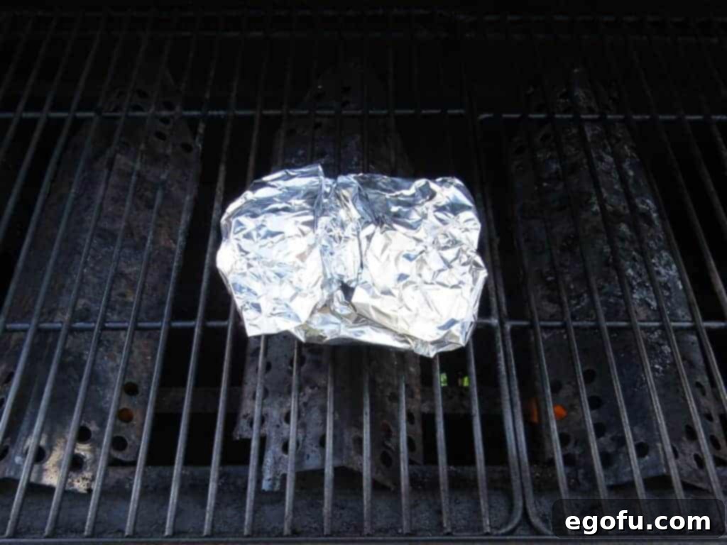 Apple Pie Packet cooking on a grill.