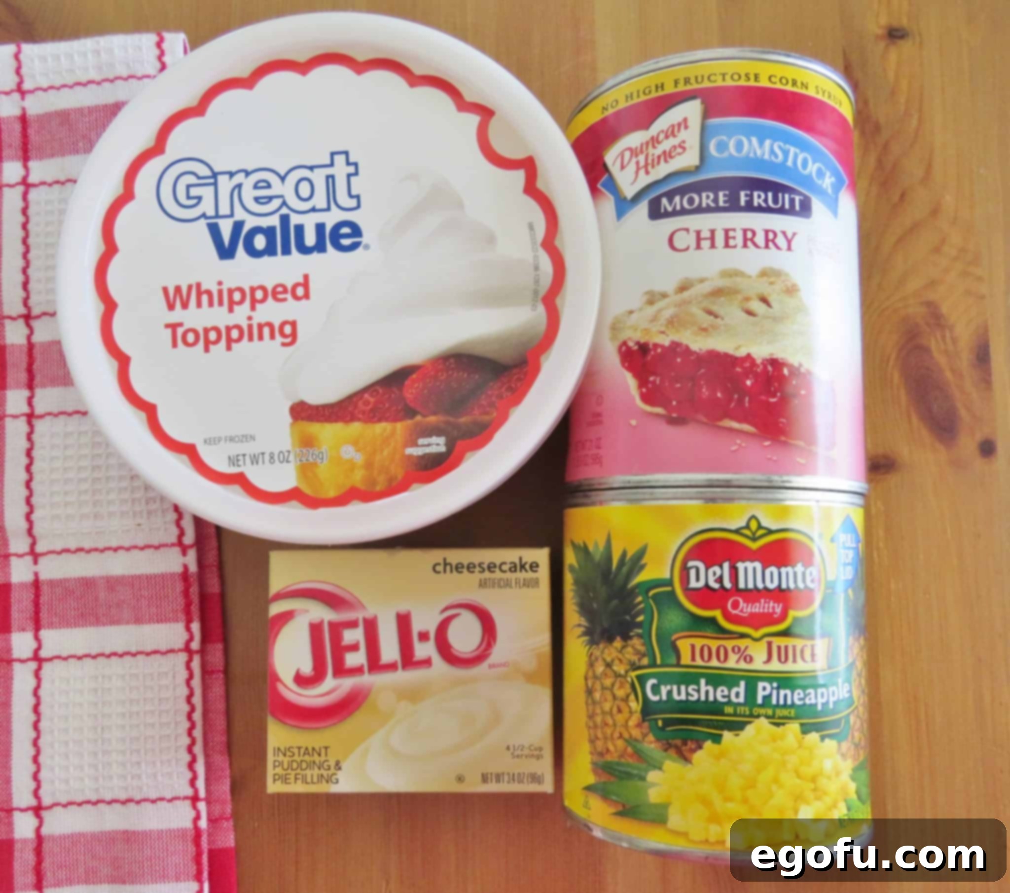 COOL WHIP, cheesecake jello, cherry pie filling, crushed pineapple in juice.