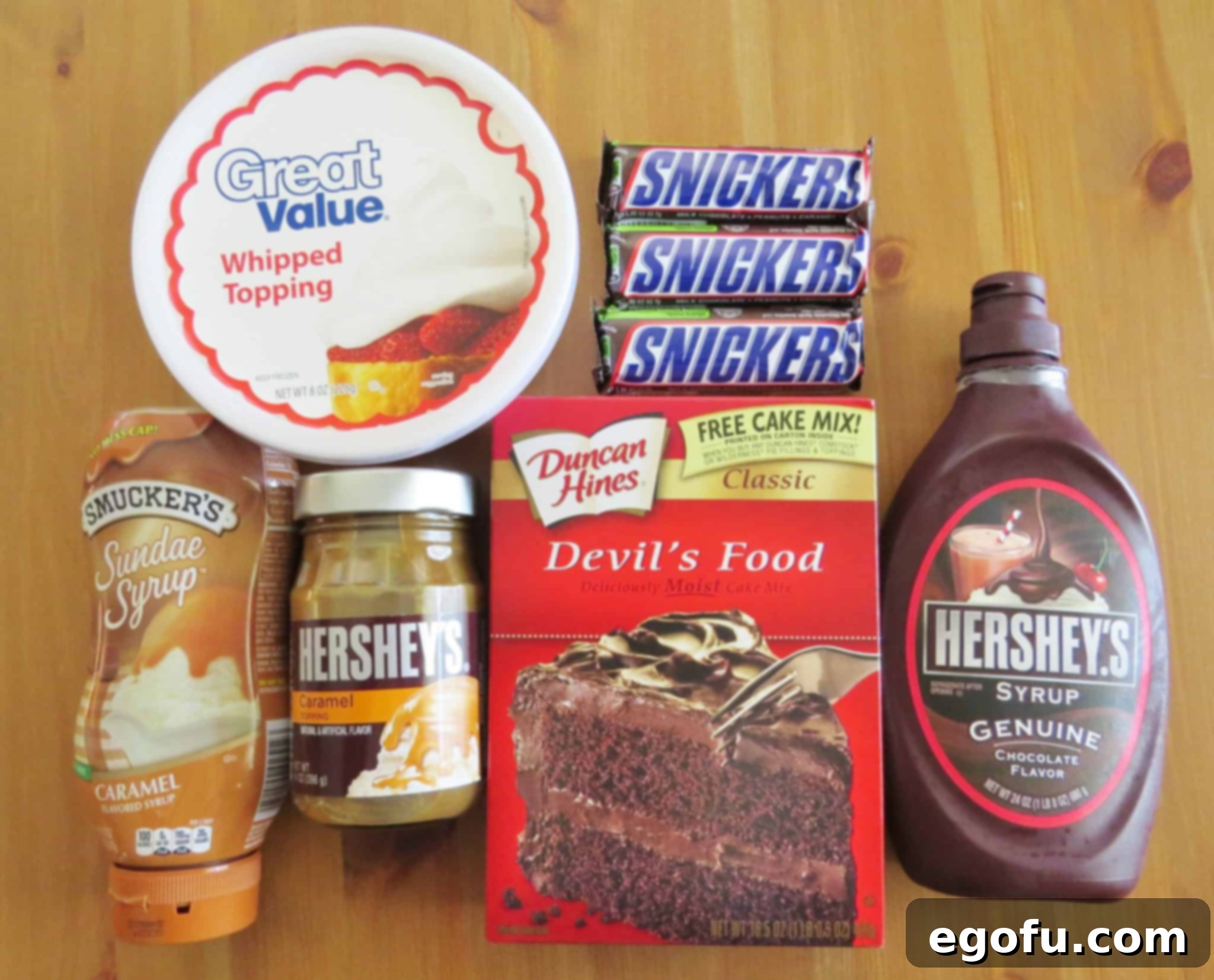 devil's food cake mix (ingredients needed to make cake, eggs, oil & water) caramel ice cream topping Snickers candy bars, whipped topping, chocolate and caramel syrup.