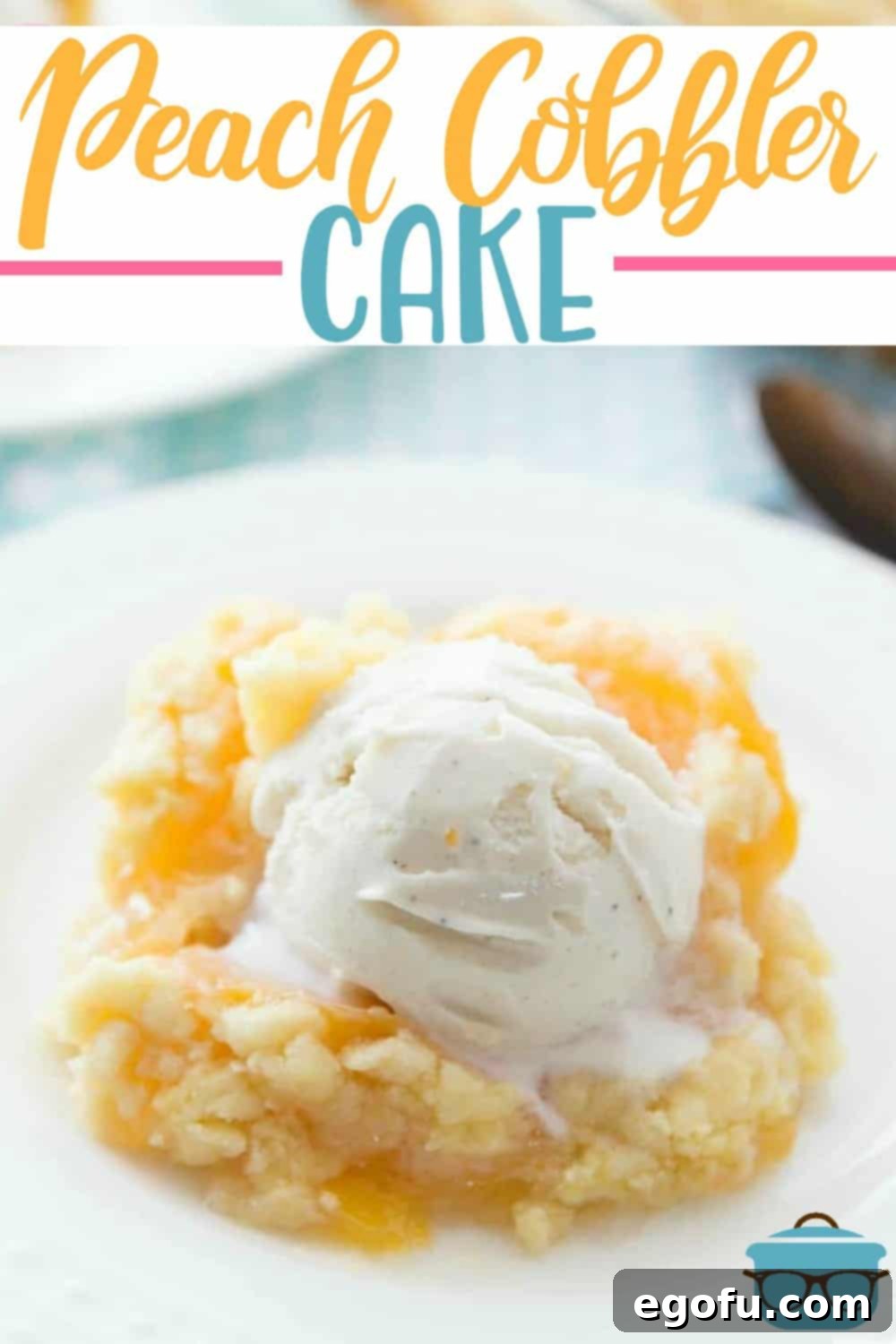 Top-down view of a whole Peach Cobbler Cake, showcasing the golden crumble topping and the vibrant peach filling peeking through.