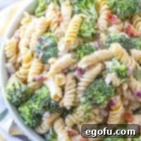 Creamy Bacon Broccoli Pasta Salad in a large white serving bowl