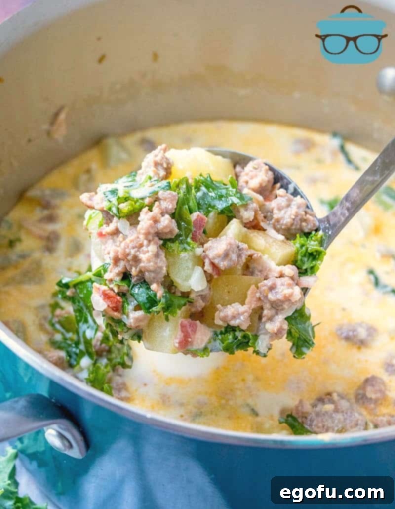The Ultimate Copycat Olive Garden Zuppa Toscana Recipe 9 a ladle holding some soup over a stock pot.