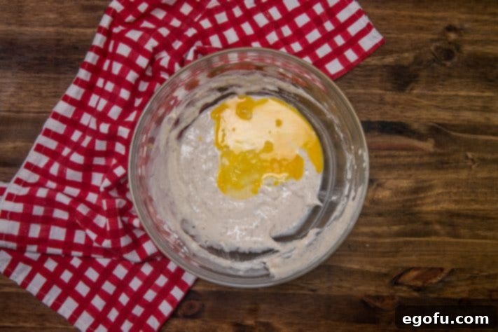 Cheesy Pepperoni Poppers 14 eggs added to batter in the bowl.