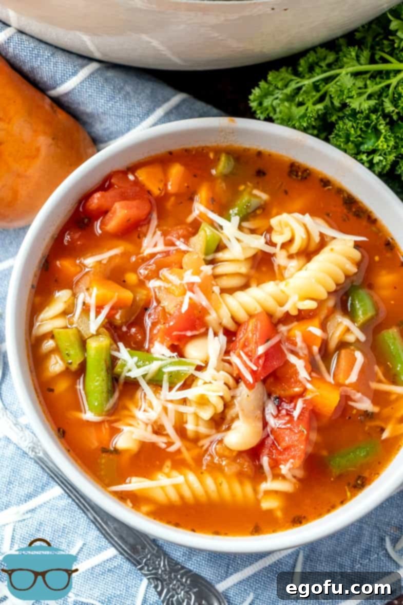 Bowl of Homemade Minestrone Soup garnished with fresh herbs