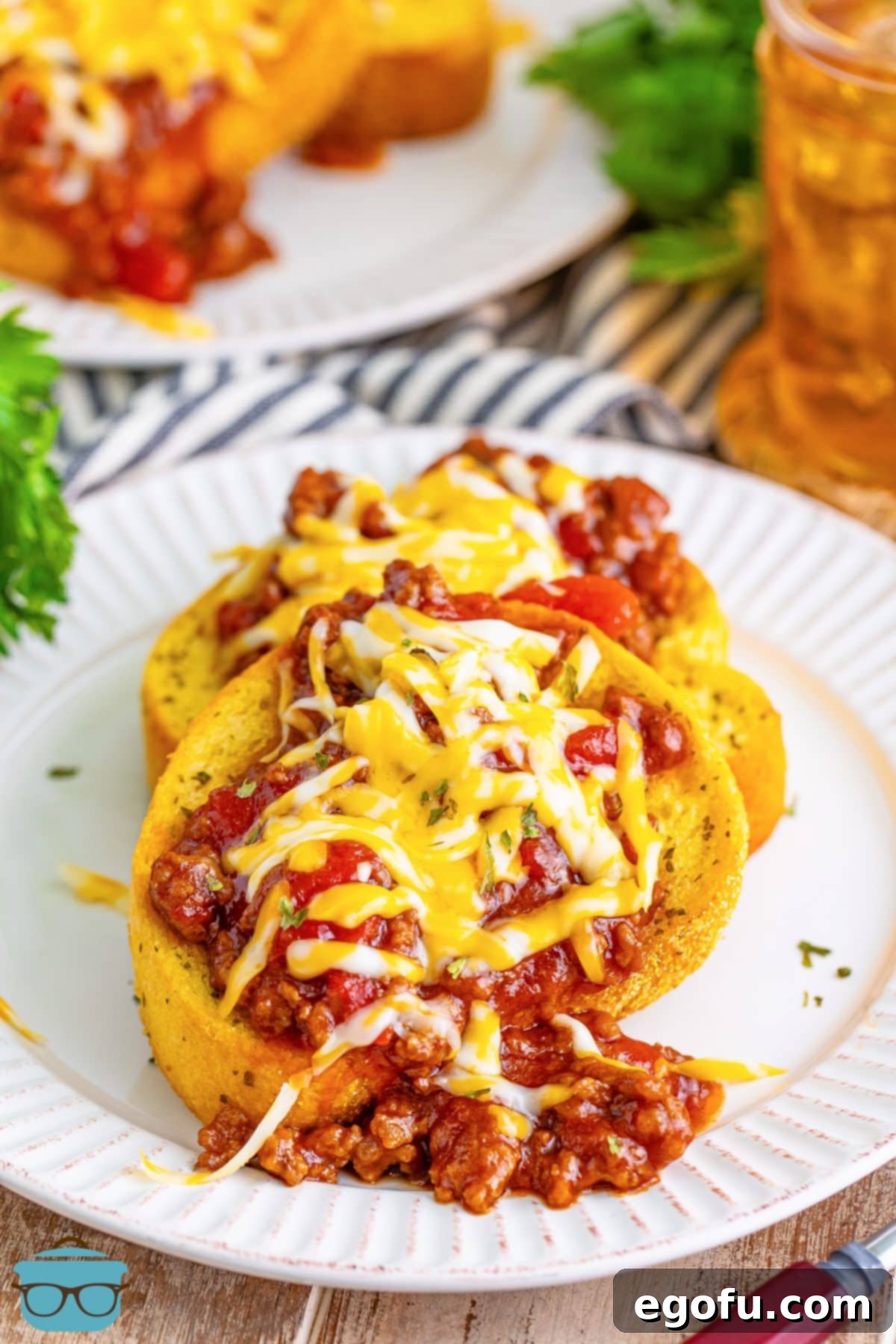 A plate with a few Texas Toast Sloppy Joes open on it.