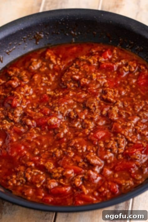 Sloppy Joe mixture in a large black skillet.