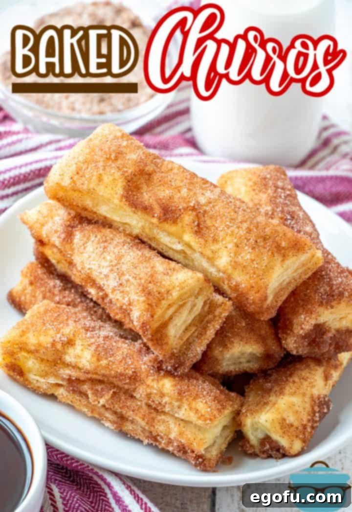 A delectable stack of easy baked churros, generously coated in cinnamon sugar, presented on a elegant white round plate, showcasing the golden crispness of the puff pastry dessert.