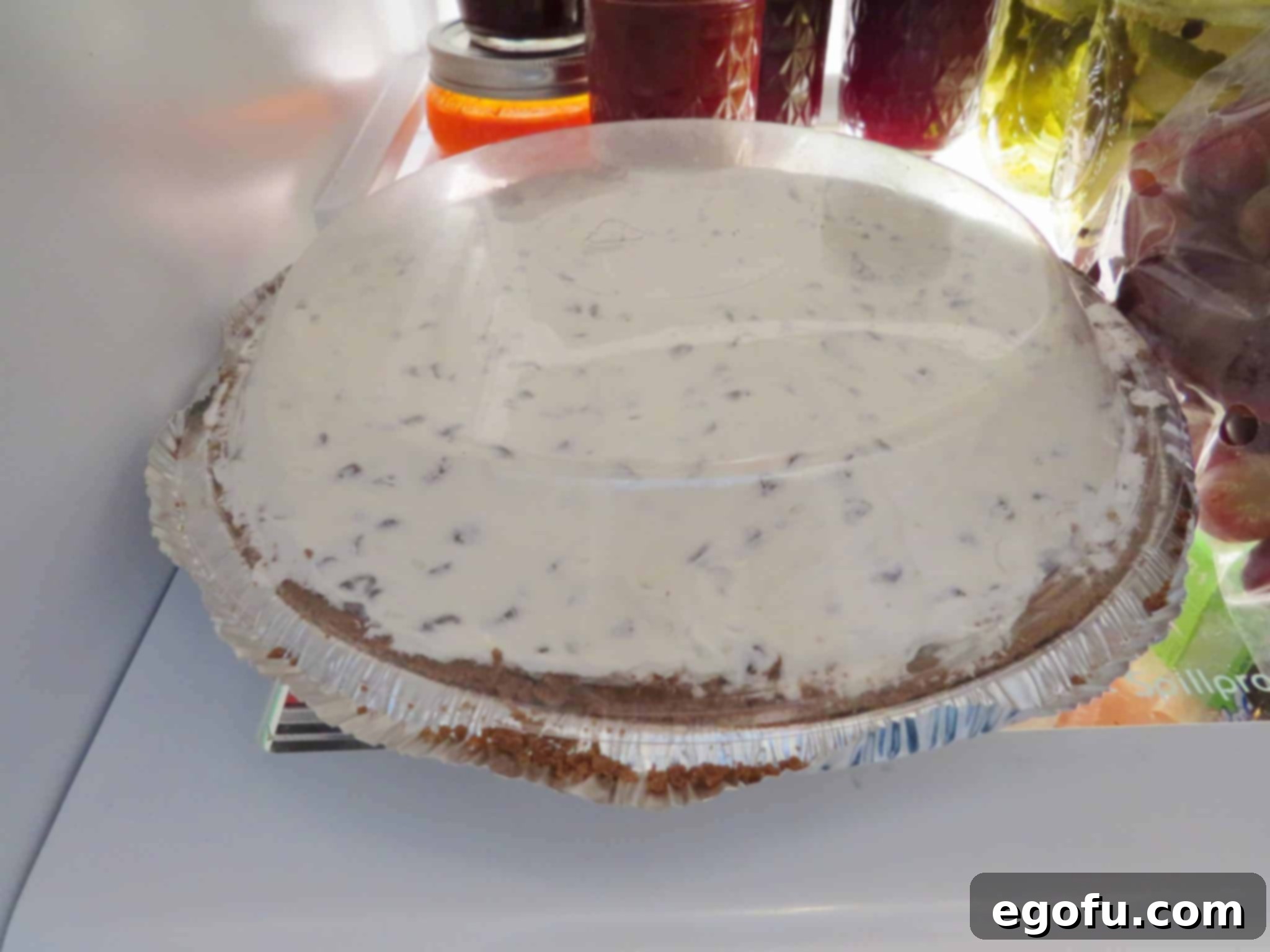 cheesecake cooling in the refrigerator.