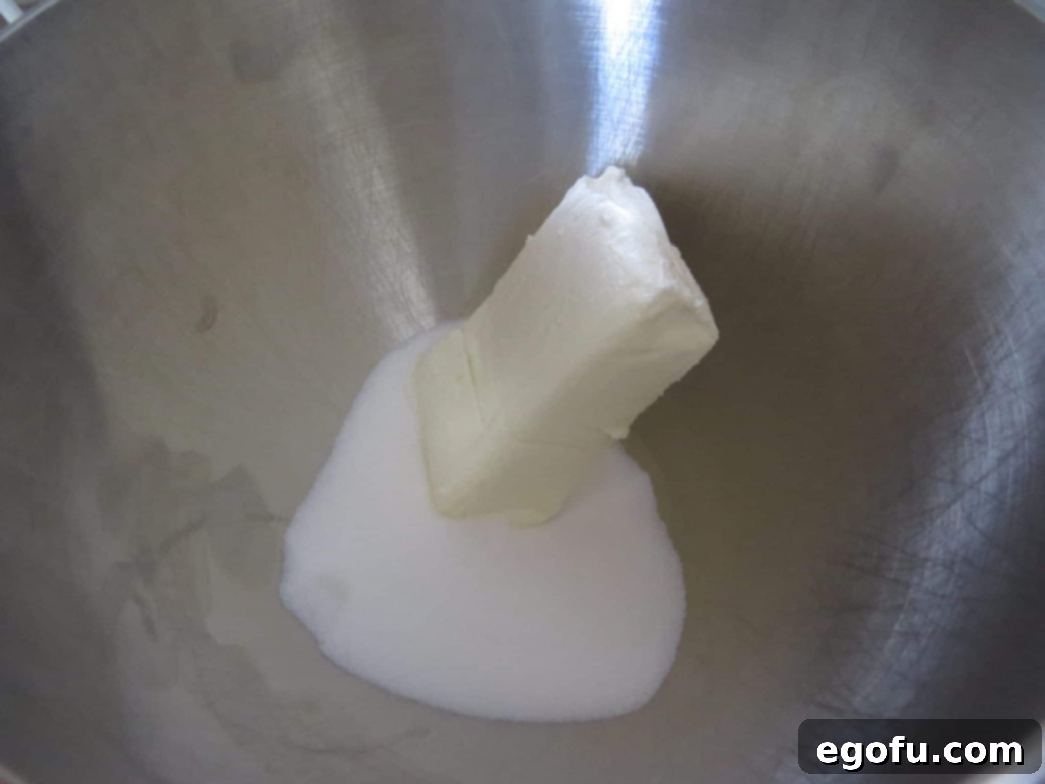softened cream cheese and sugar in a stand mixer.