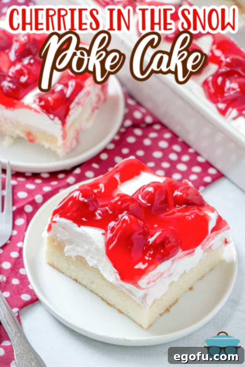 Ruby Snowdrift Cake 3 Two slices of the elegant Cherries in the Snow Poke Cake, one on a white plate with another slice blurred in the background, inviting you to take a bite.