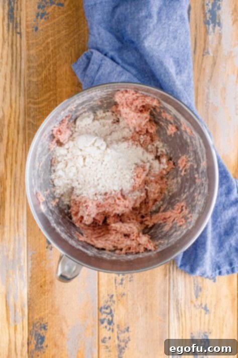 Cream Cheese Sausage Poppers 11 Bisquick baking mix added to the bowl of a stand mixer.